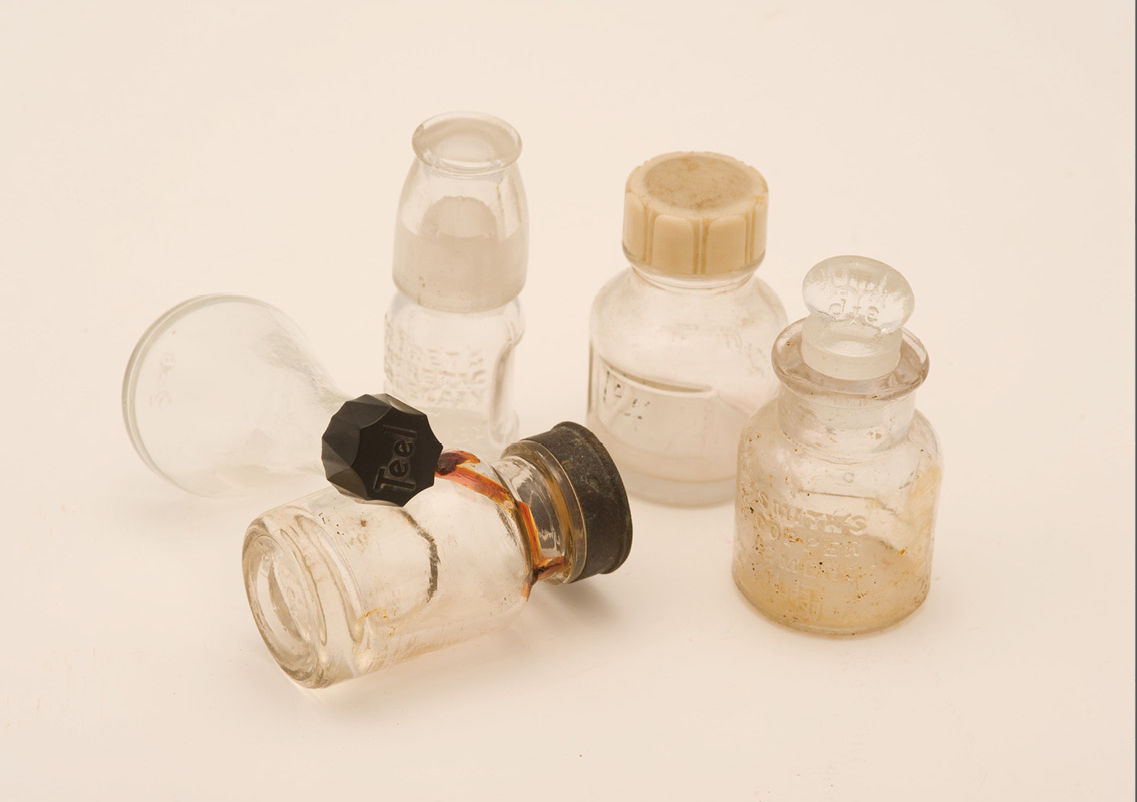 Variety of dental product bottles (circa 1920-1940)